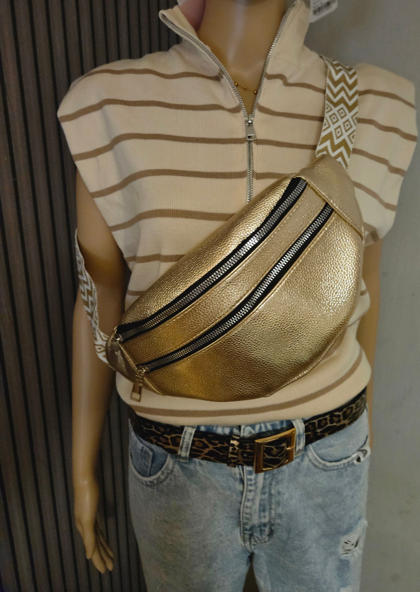 Pull sans manche rayé avec fermeture