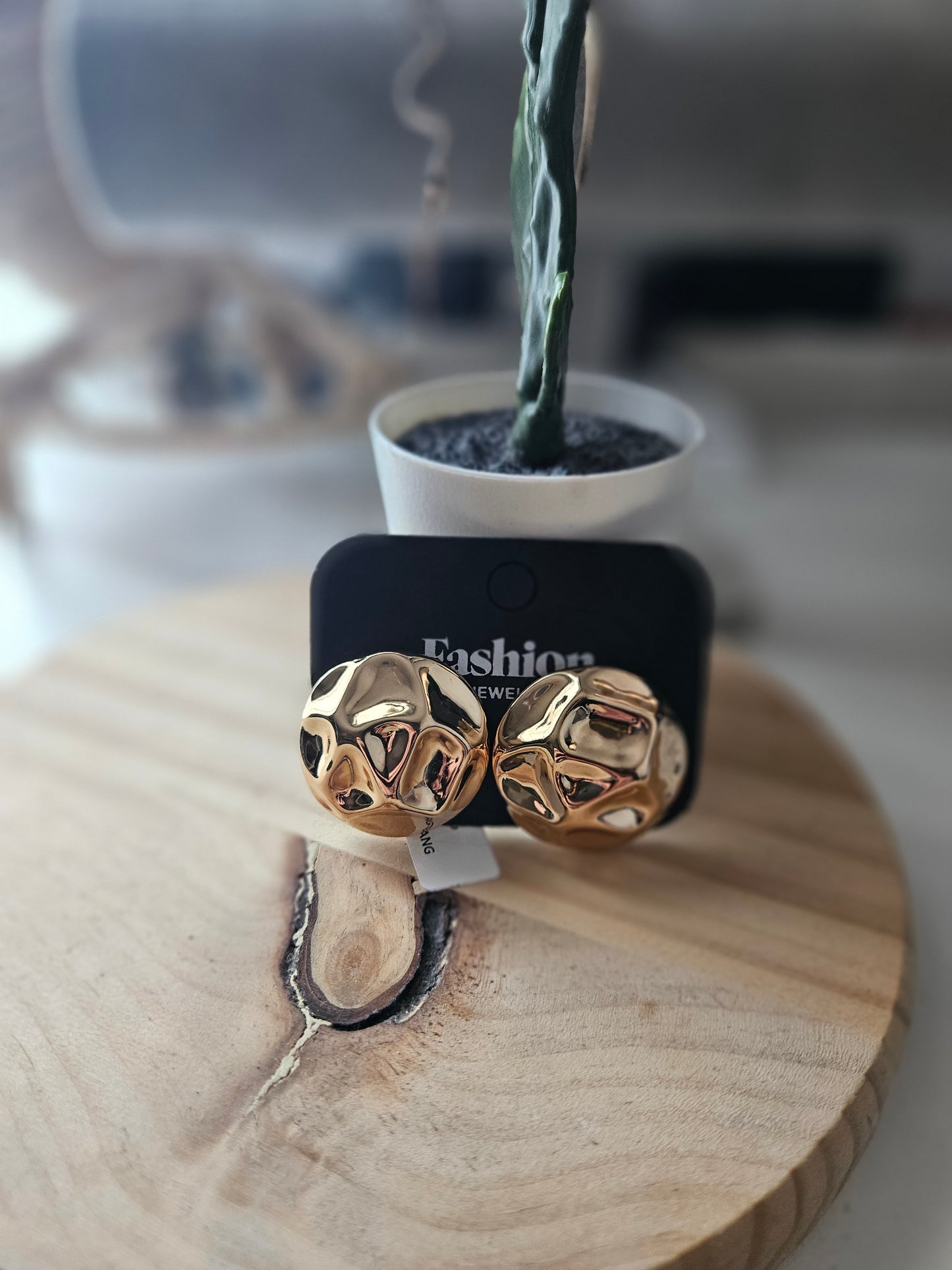 Boucles d'oreilles dorées abstraites