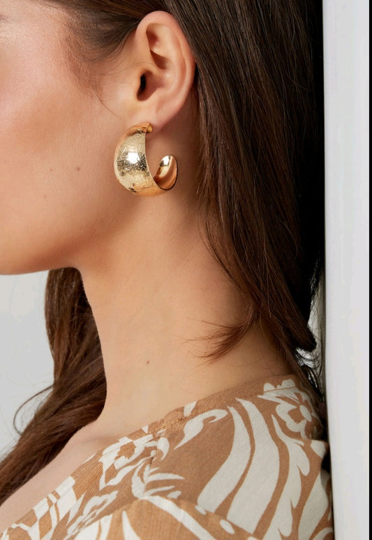 Boucle d'oreille croissant de lune dorée
